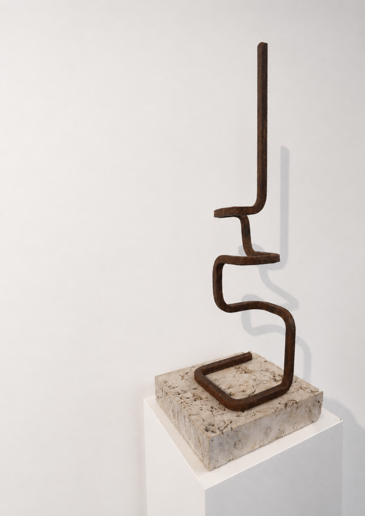 La Ligne, 2025, corten steel, travertine stone base, 70 × 25 × 25 cm