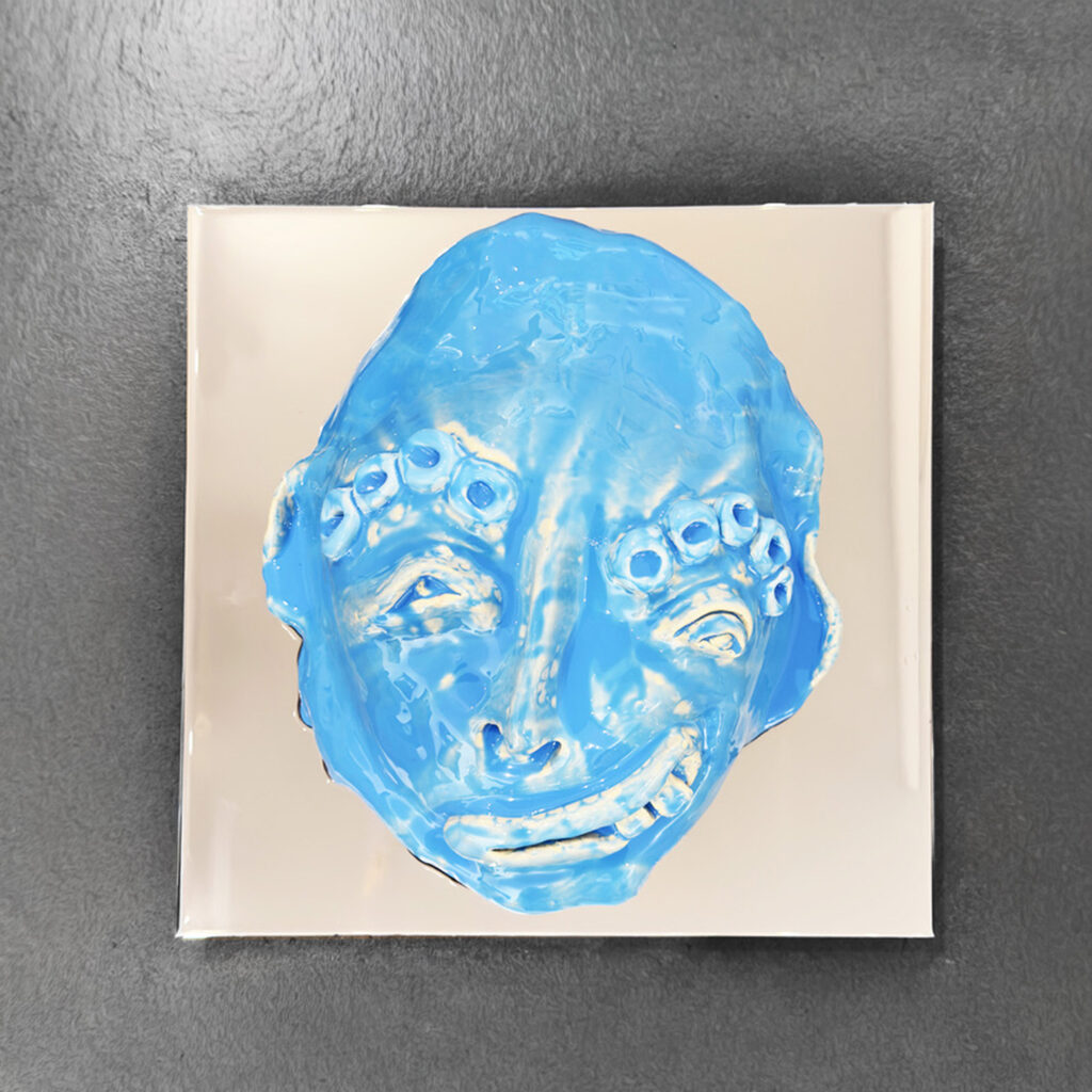 Ceramic Mask On Mirror, ​Ceramic - 5 kg -Size Varies corca : ø 30 cm