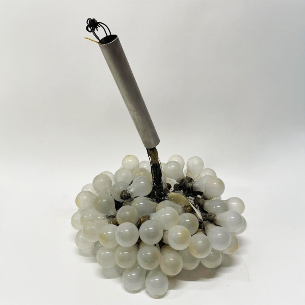 Chandelier in chromed metal with an accumulation of lightbulbs connected by wire (some accidents and losses); Height: 80 cm; Diameter: 50 cm.