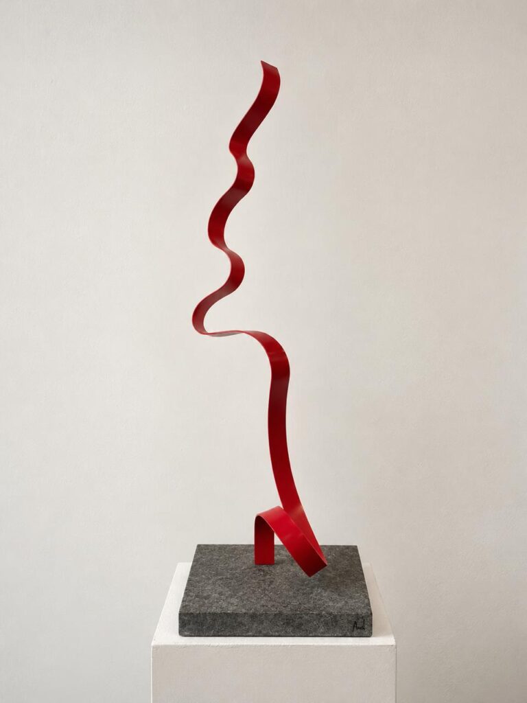 Serpentine, 2026, corten steel, stone, 84 x 25 x 25 cm.