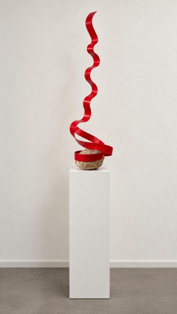 Serpentine, 2026, corten steel, stone, 120 x 40 x 40 cm.